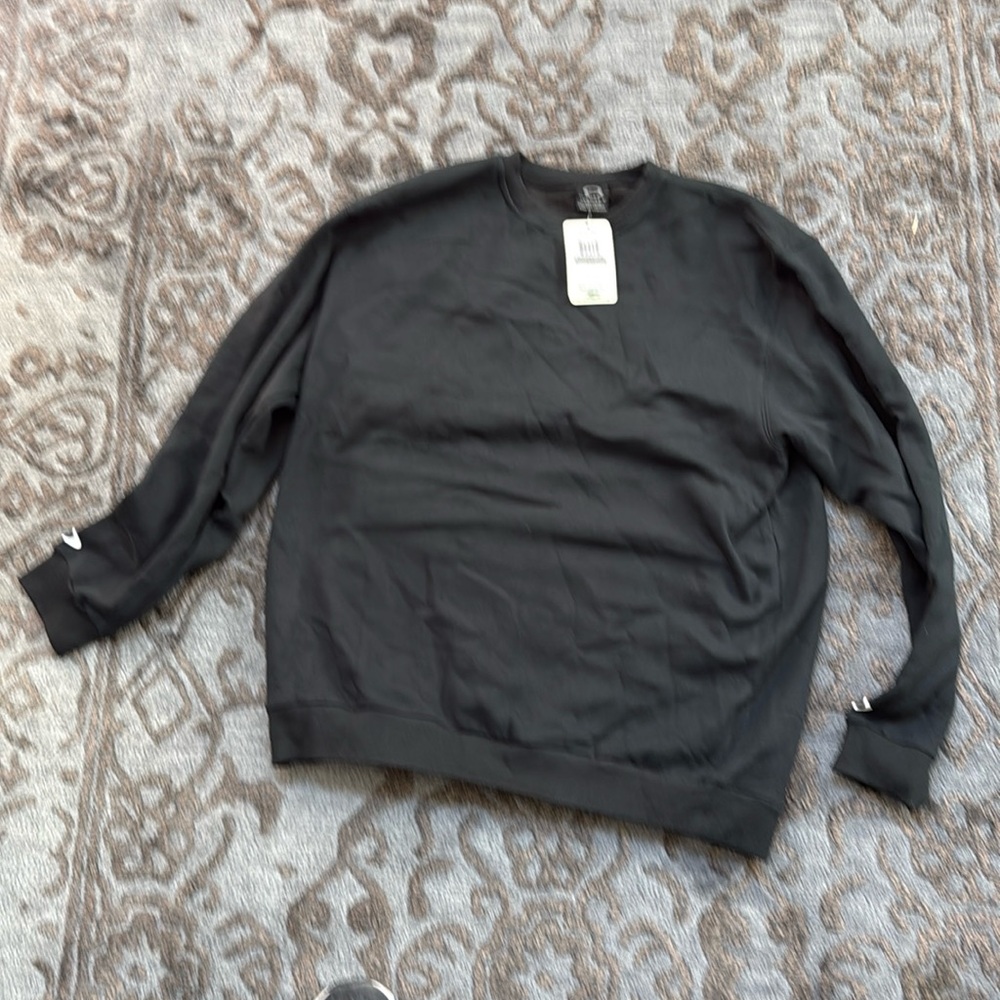 Oakley fleece black sweatshirt with Oakley on the back and “o’s on sleeves NWT